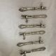 Silver duck sleeve clips, 19th century neck brace