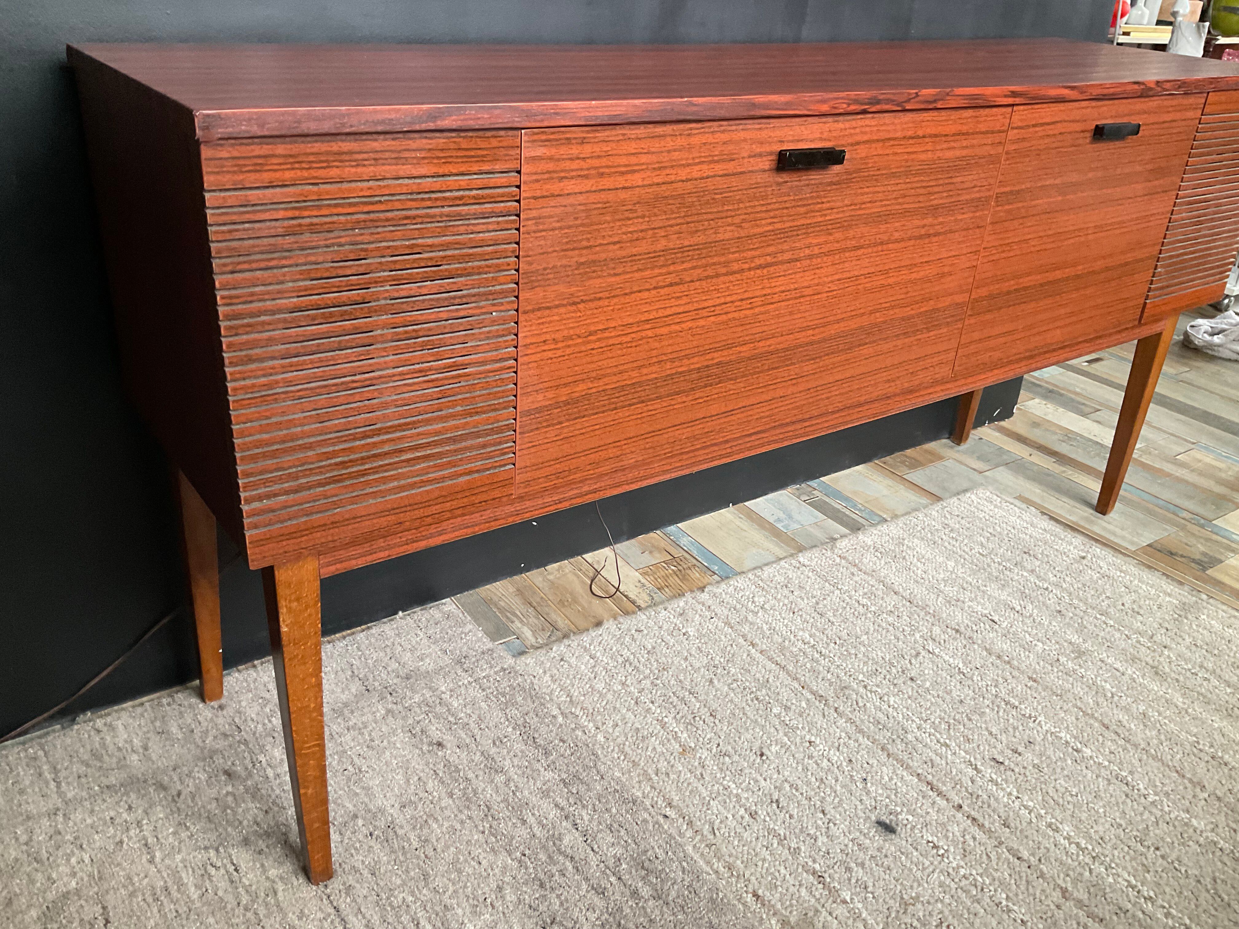Vintage TV sideboard with radio and turntable.