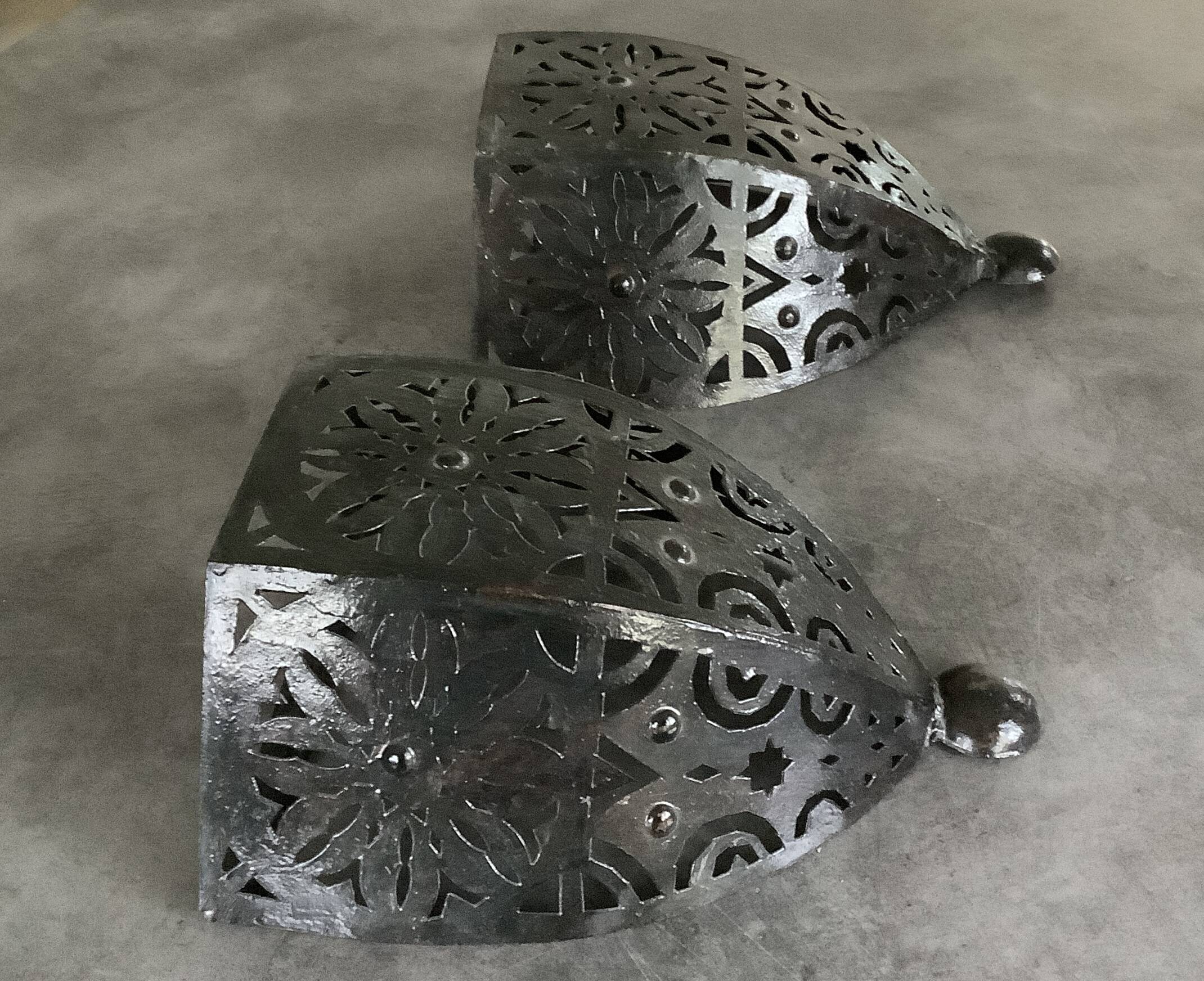Pair of Wall Sconces in Iron with Cut-Out Patterns