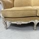 Louis XV style three-seater wingback sofa in patinated beech, 20th century