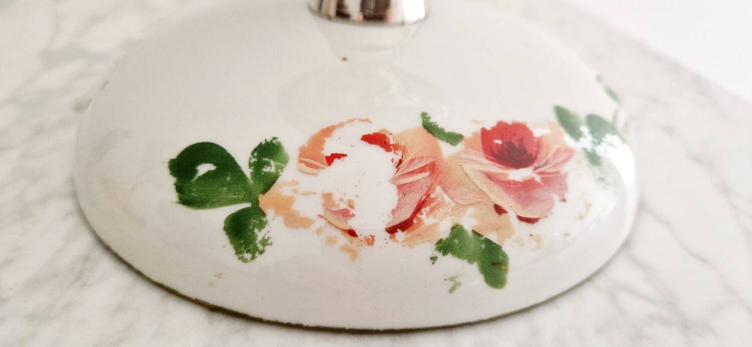 Porcelain cup on silver metal foot