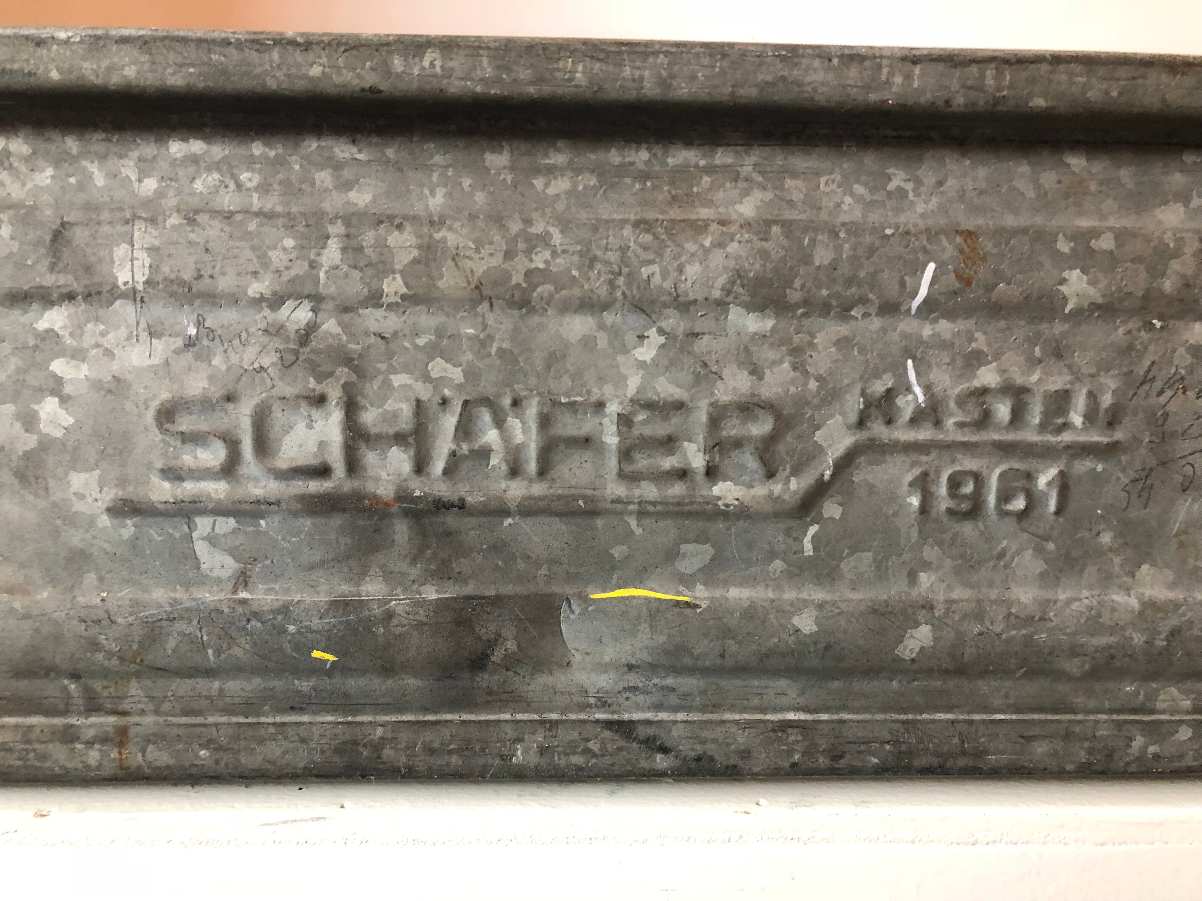 Old galvanized metal locker basket