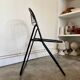 Black metal folding chair
