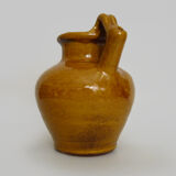 Pottery in glazed yellow terracotta. year 70 80