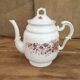 Teapot and its vintage porcelain milk jar