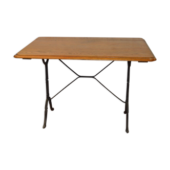 Bistro table with a cast iron base