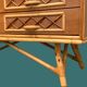 Rattan wardrobe with tapered legs from the 1960s.