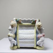 Small porcelain planter in antique German Putti style Meissen from the 19th century.