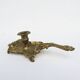 Antique rococo-style hand candlestick in bronze or brass