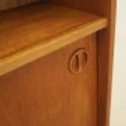 Danish teak veneered bookcase with sliding doors, 1970s