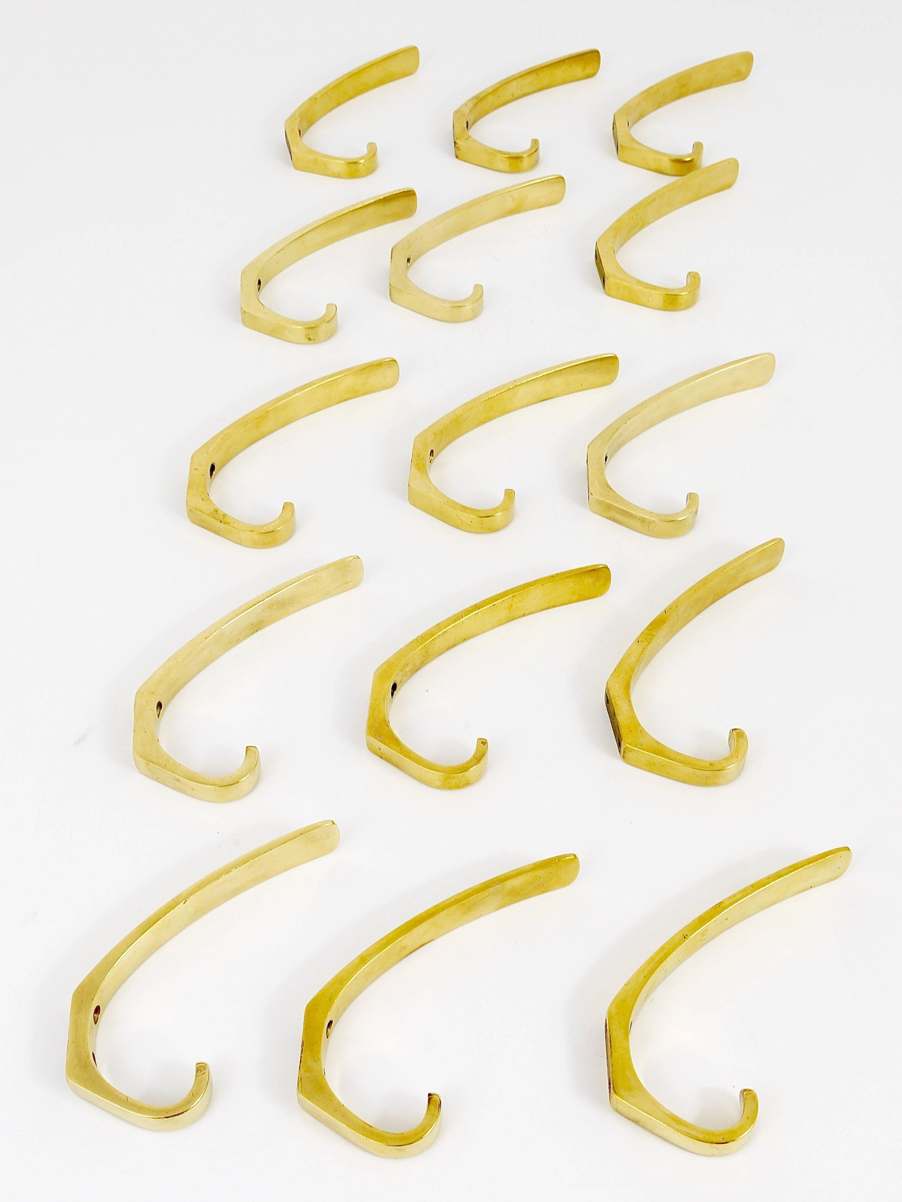 9 vintage brass wall hooks by Herta Baller, Vienna, Austria, 1950s.