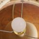 Petite lampe années 60 en grès avec médaillon émaillé brun foncé