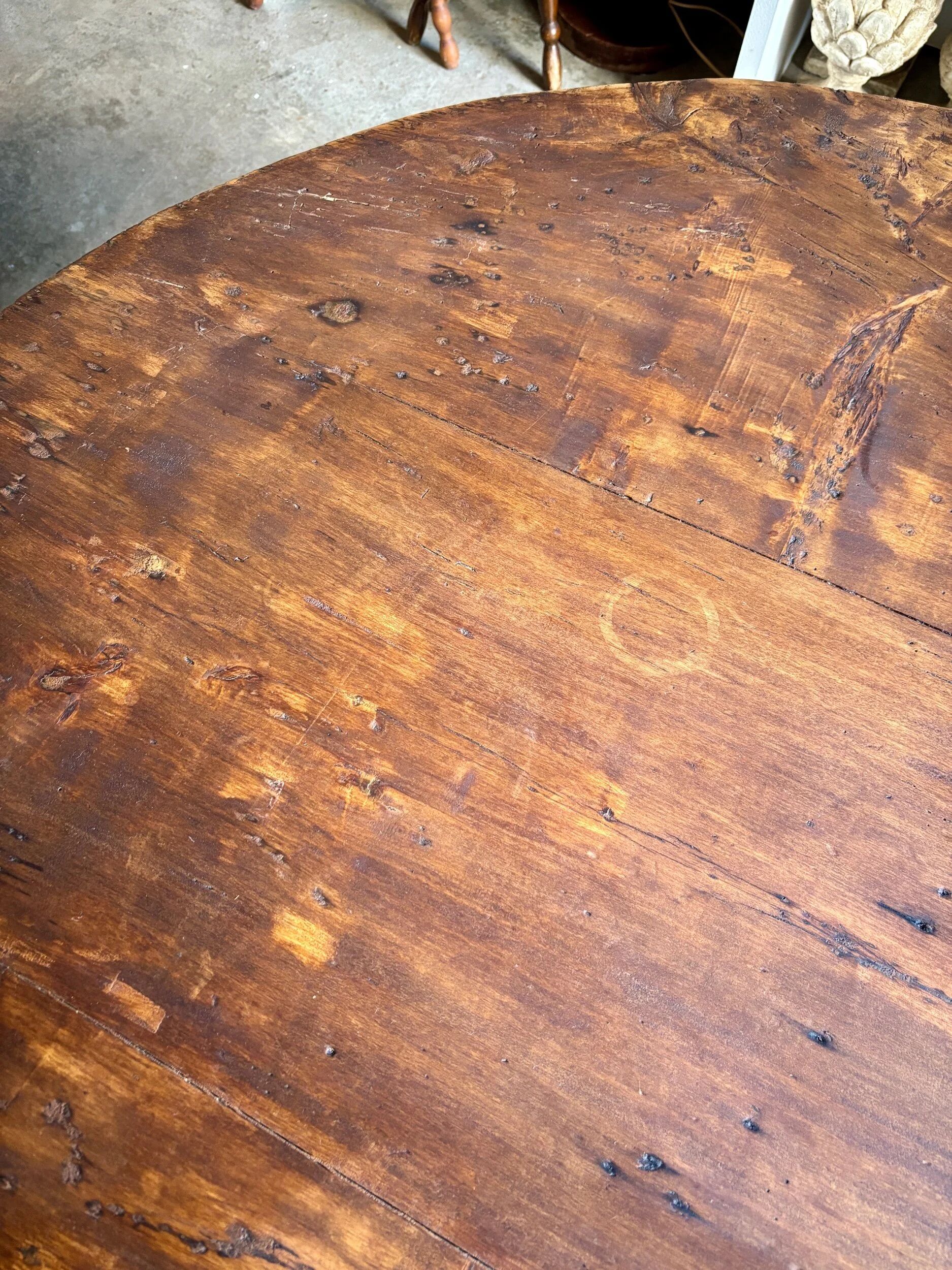 Round wooden farmhouse table