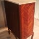 Flowered marquetry commode in Louis XV style