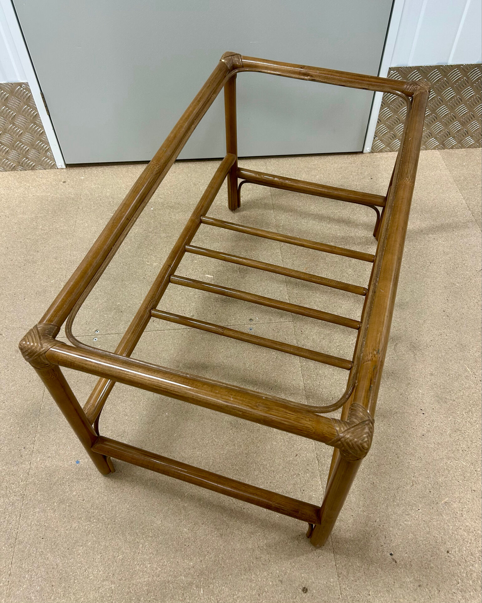 Vintage rattan coffee table (without glass) from the 1970s.