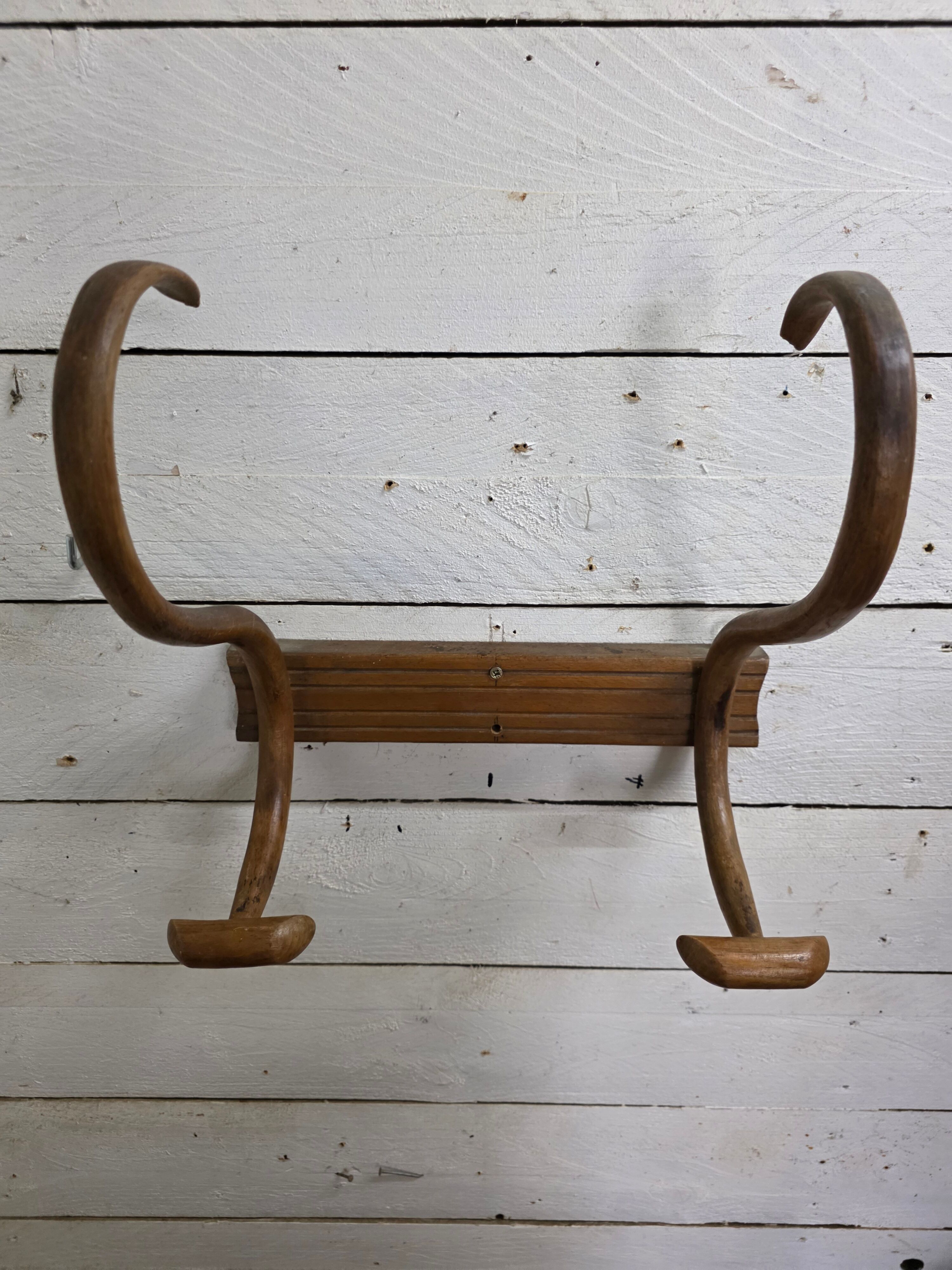 Curved wooden coat rack with 2 hooks, 1920s.