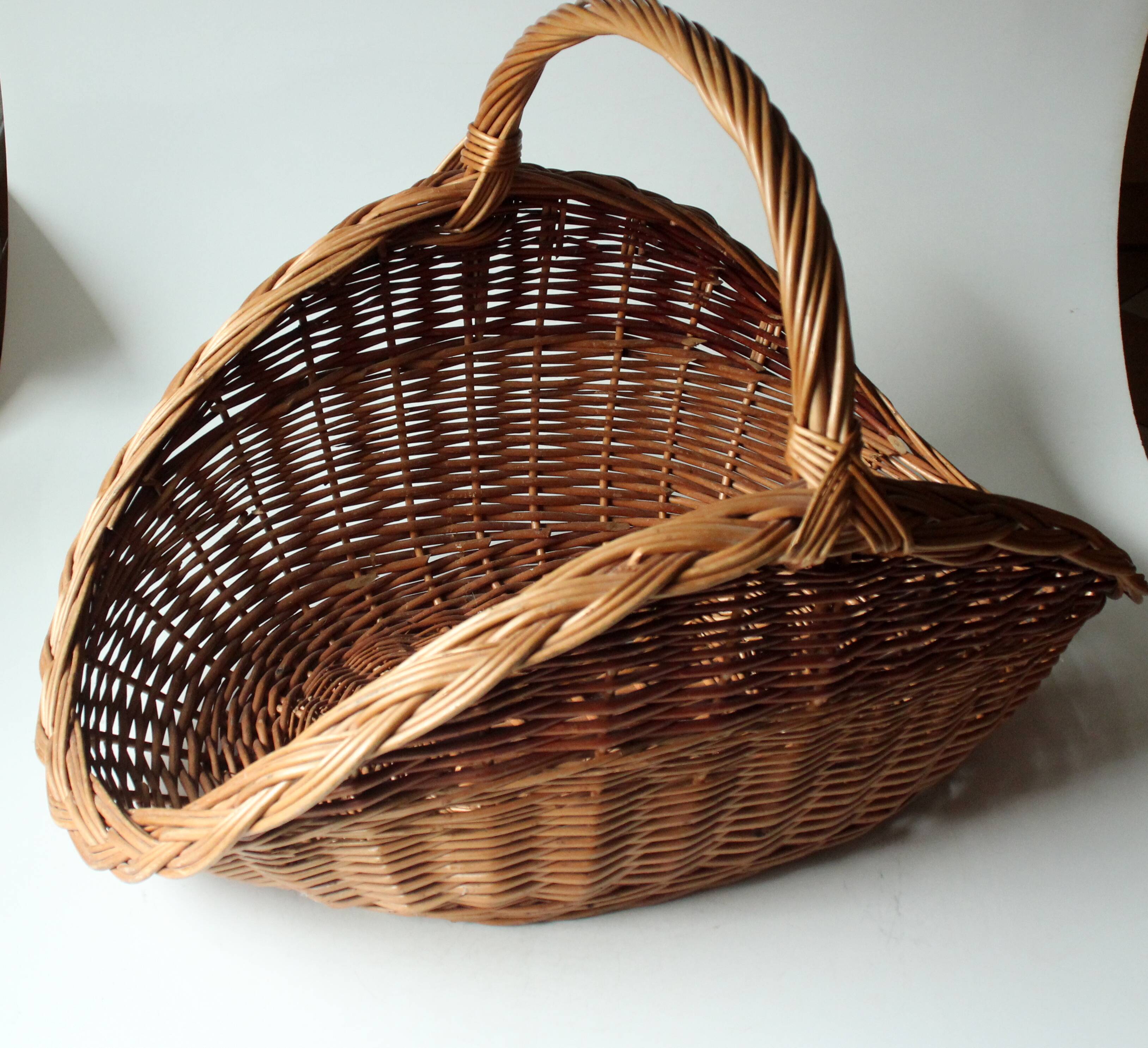 Large handmade solid wicker braided firewood basket, vintage from the 80s