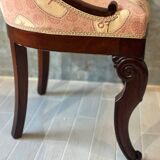 Pair of carved solid mahogany gondolas from the 19th century
