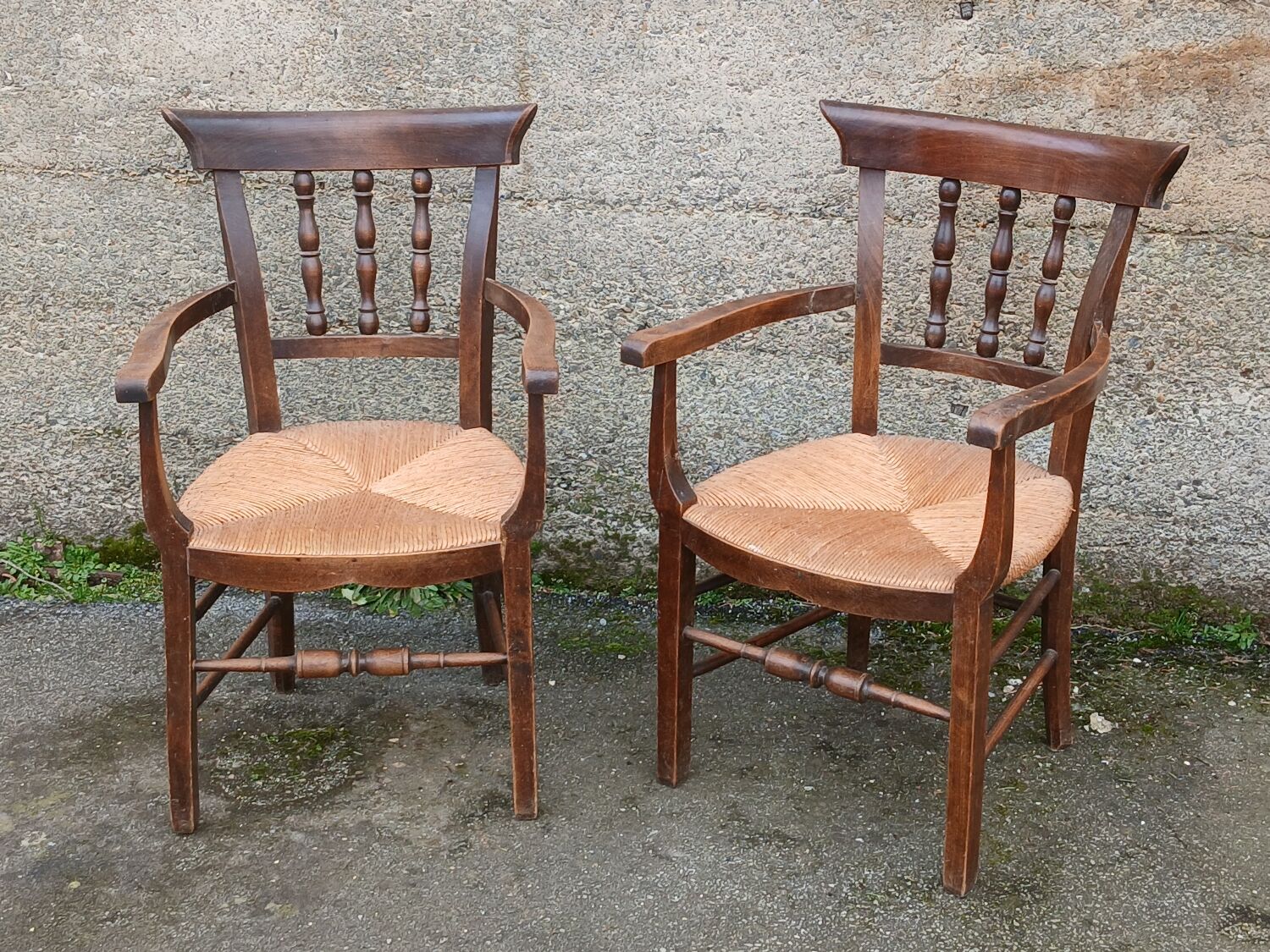 Pair of antique straw-seated armchairs