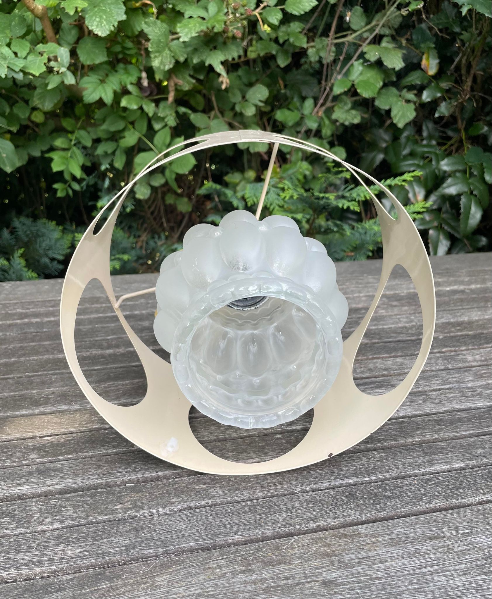 Suspension in bubbled frosted glass with its openwork entourage 70s