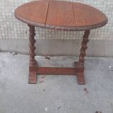 Coffee table with drop-leaf doors