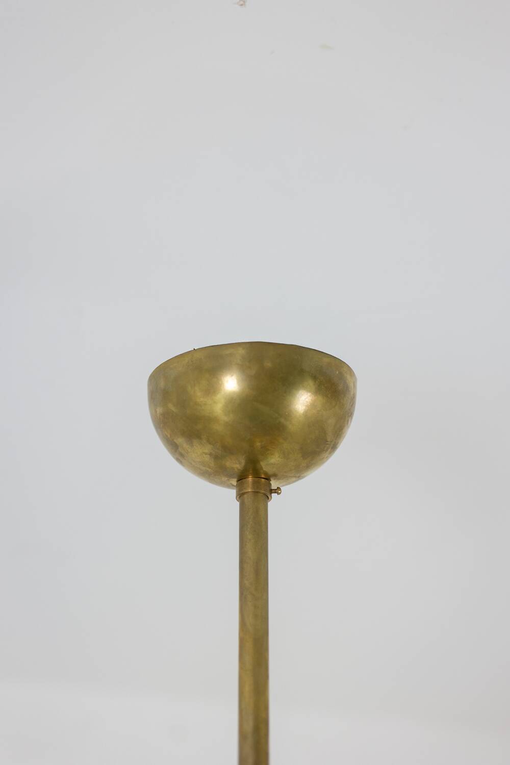 Contemporary 12-light diabolo-shaped radiant chandelier.