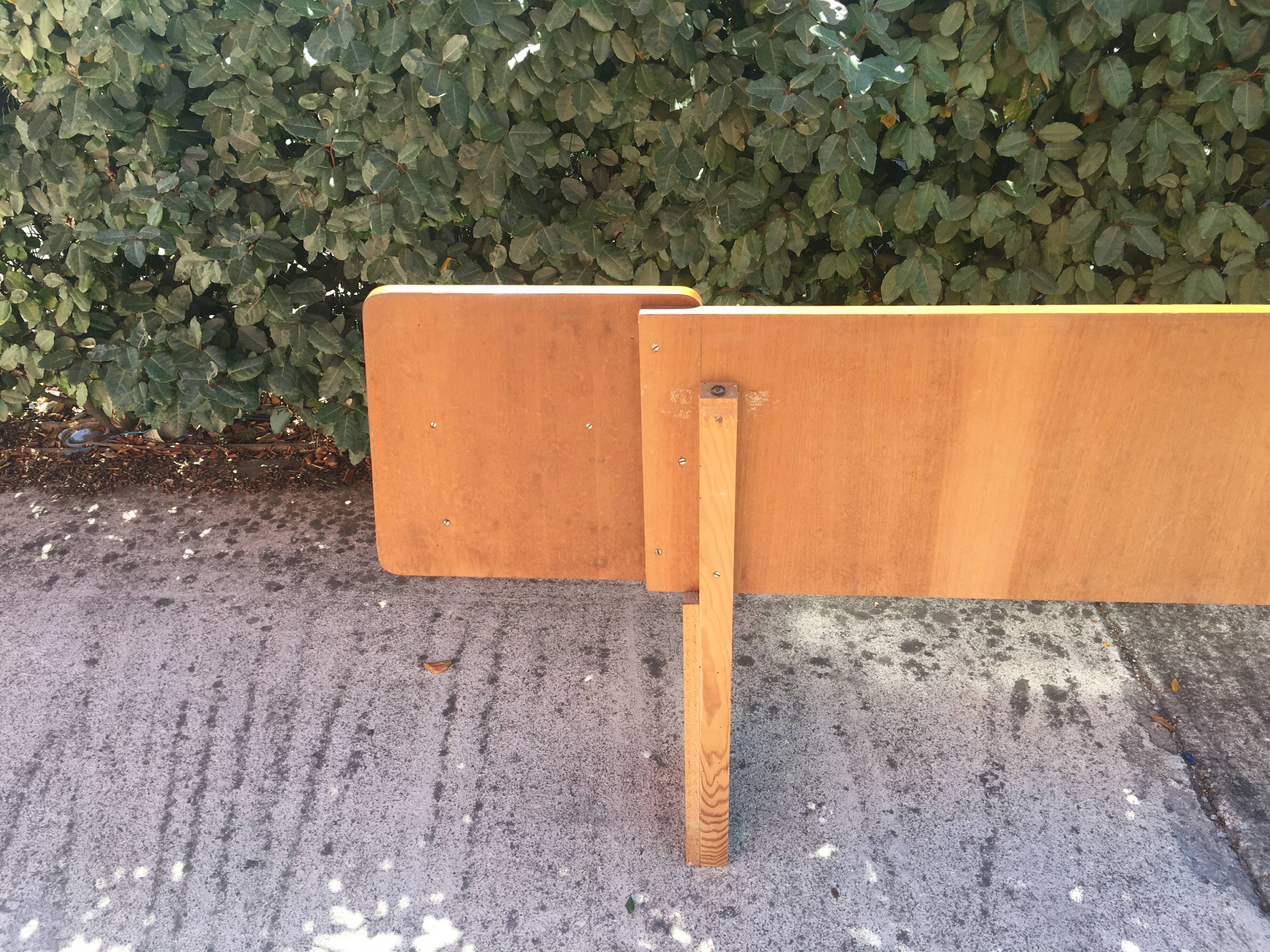 Vintage headboard with hanging bedside tables