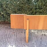 Vintage headboard with hanging bedside tables