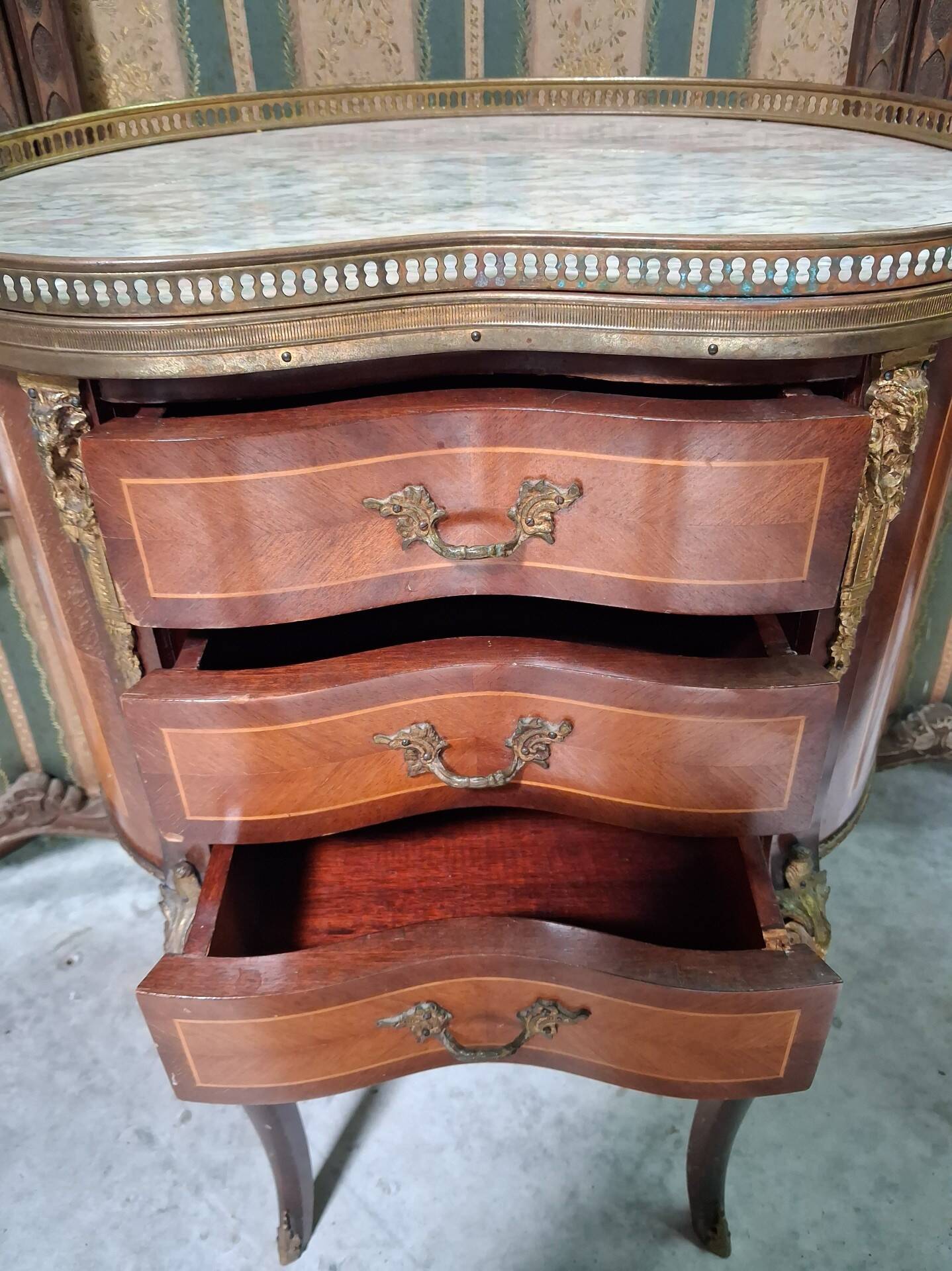 Lady's demi-lune commode in Louis XV style with marquetry and gilded bronze.