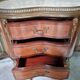 Lady's demi-lune commode in Louis XV style with marquetry and gilded bronze.