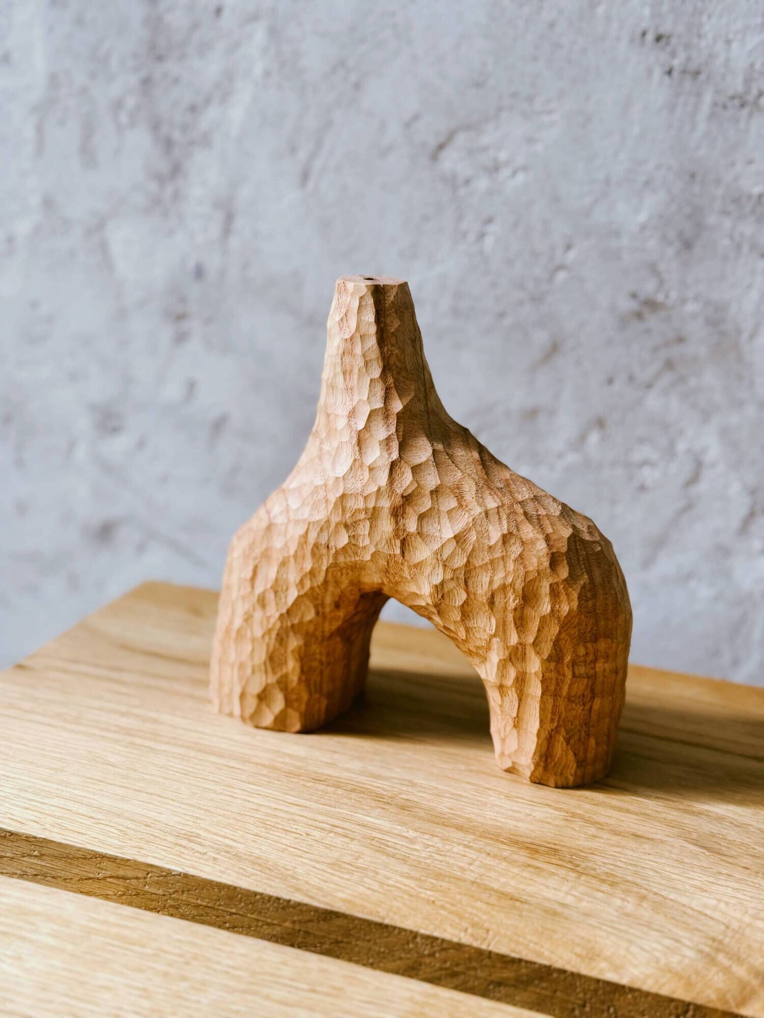 Hand-carved soliflore vase in solid chestnut wood.