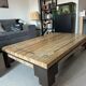 Coffee table in travertine with mother-of-pearl inlays.