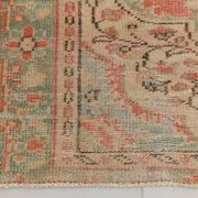 Tapis vintage rouge pâle