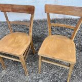 Series of 4 chairs in vintage light wood beech