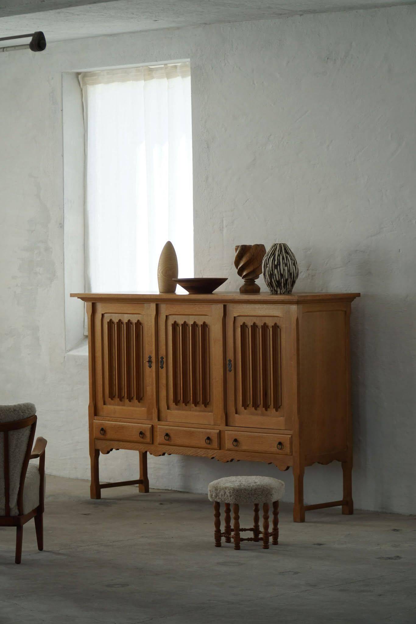 Brutalist oak sideboard, mid-century Danish design, Kjærnulf style, 1960s.