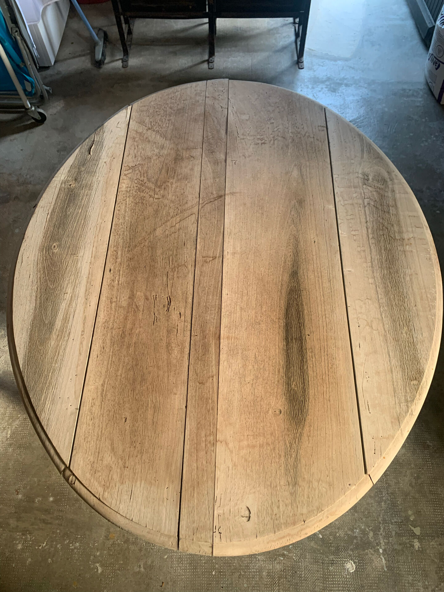 Oval drop-leaf table