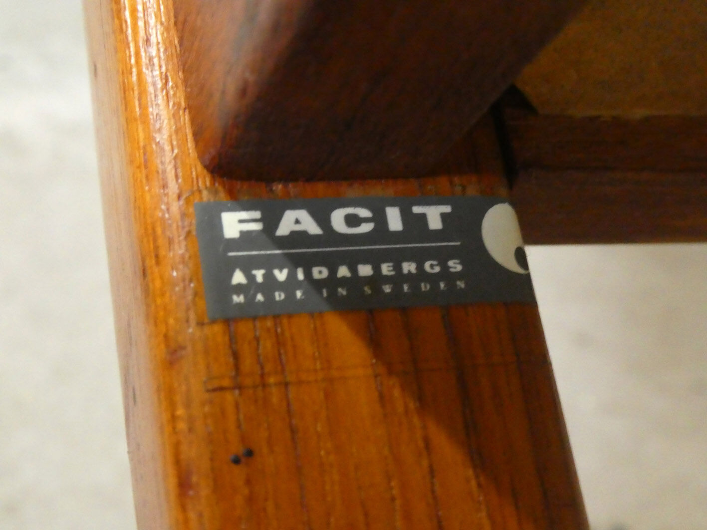 pair of Scandinavian teak armchairs and white buckles