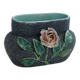 Antique jardinière with rose design in barbotine pottery.