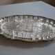 Silver-plated metal aperitif serving tray with HKE hallmark and glass.