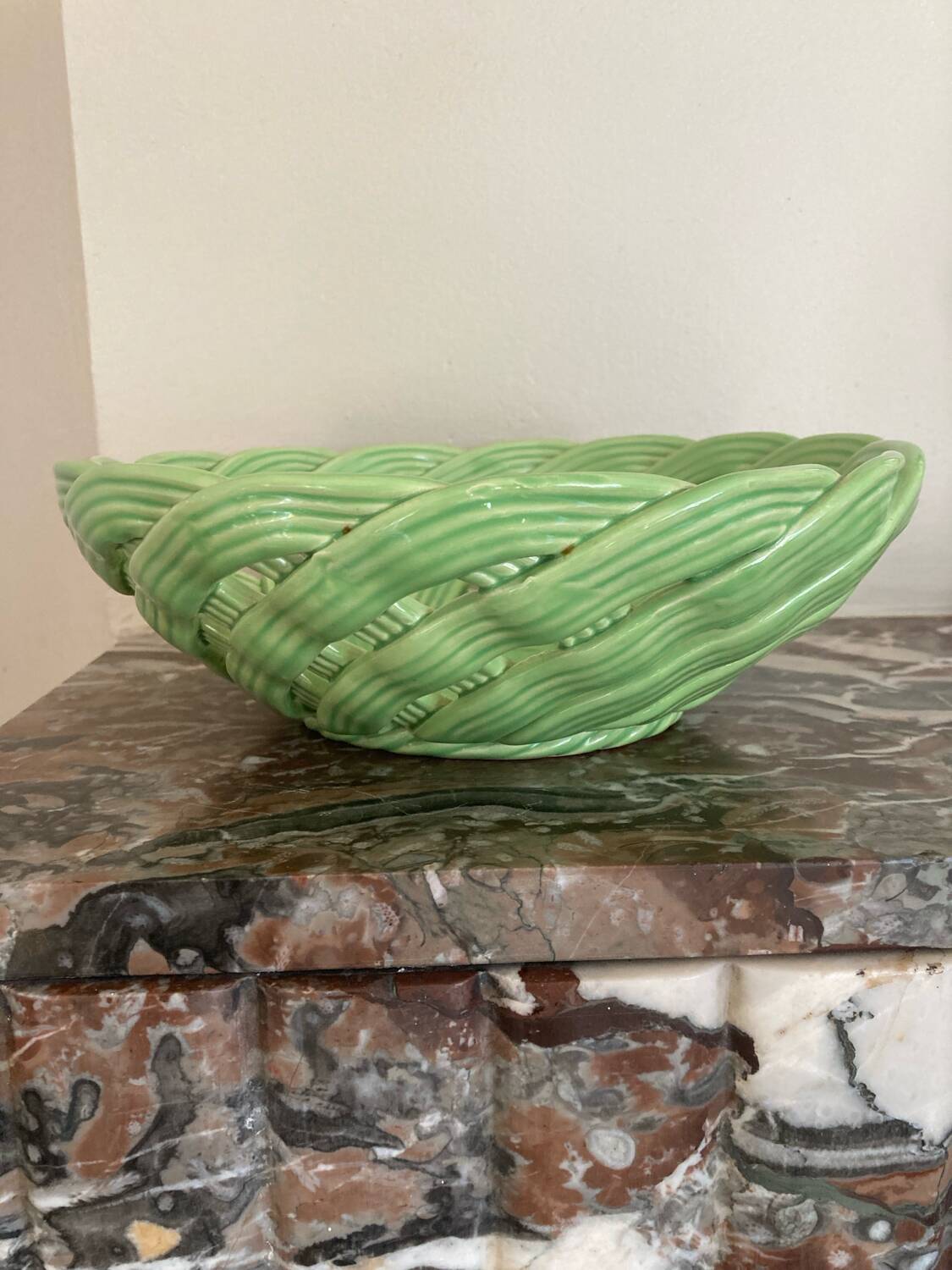 Green woven ceramic basket
