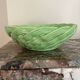 Green woven ceramic basket
