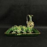 Service à liqueur en cristal teinté vert avec rehauts de dorures à décor de