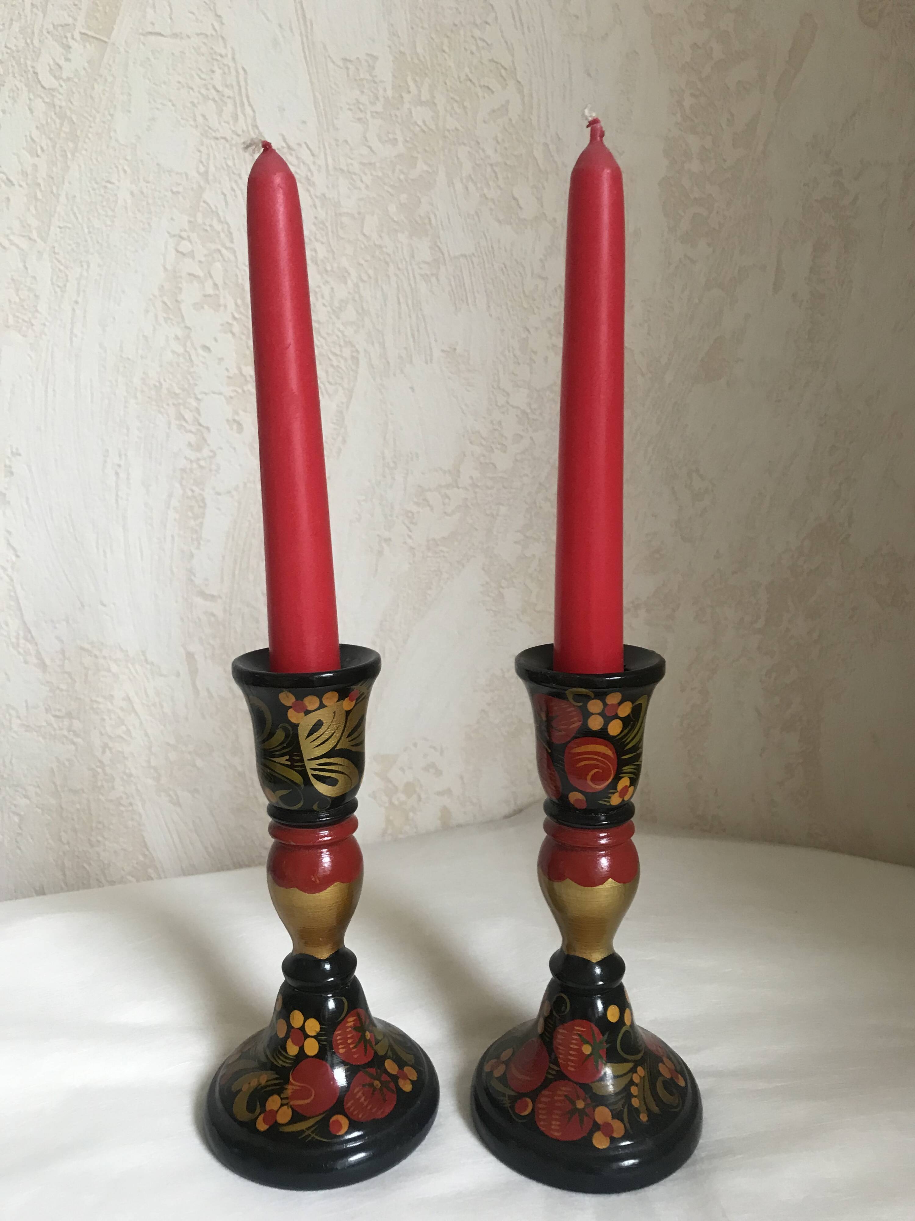 Varnished wooden candle holders