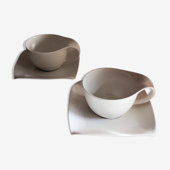 Duo large Paris porcelain cups and saucers