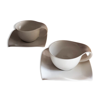 Duo large Paris porcelain cups and saucers