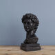 David head in black waxed bean