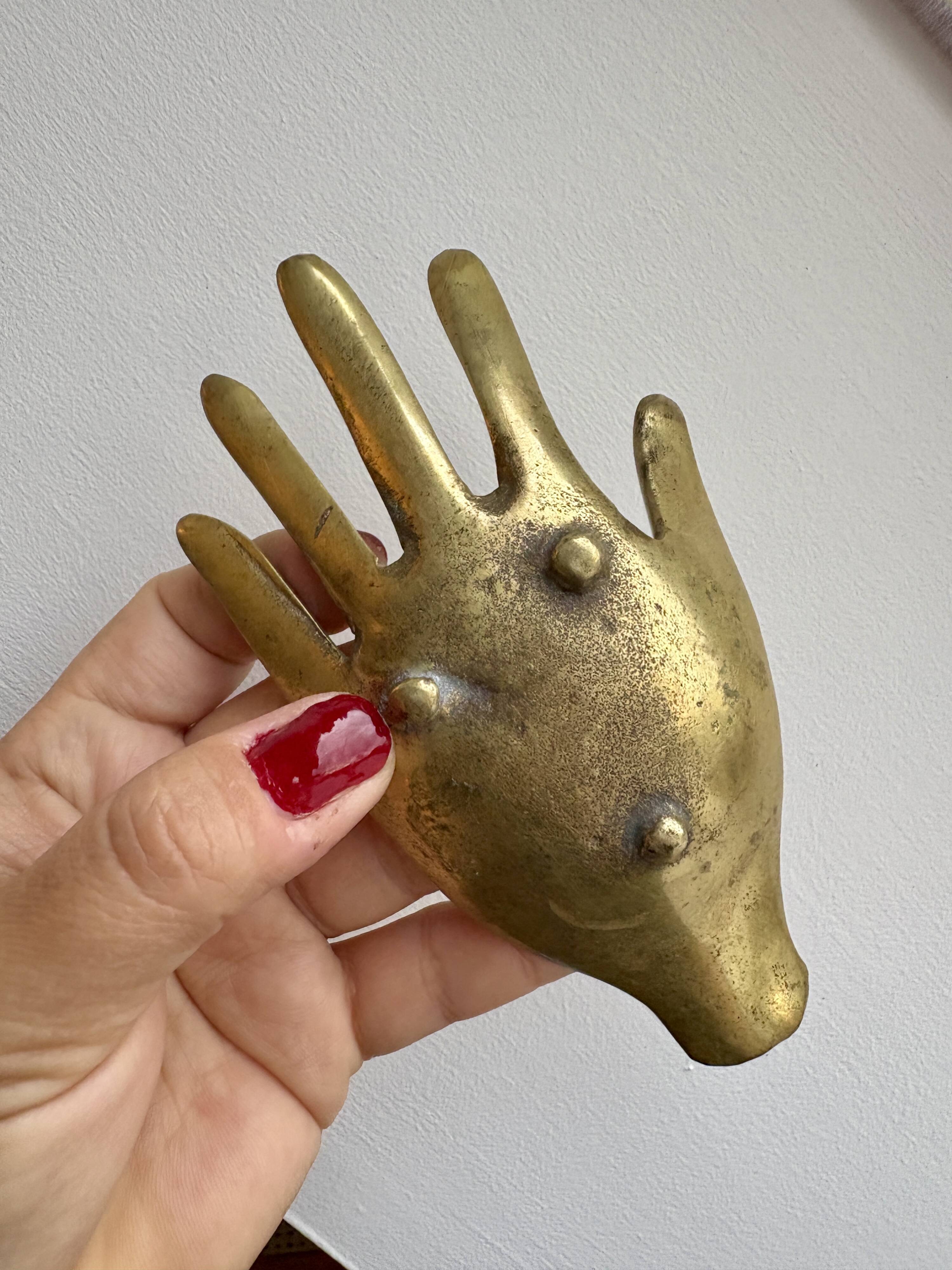 Vintage brass hand ashtray/trinket tray