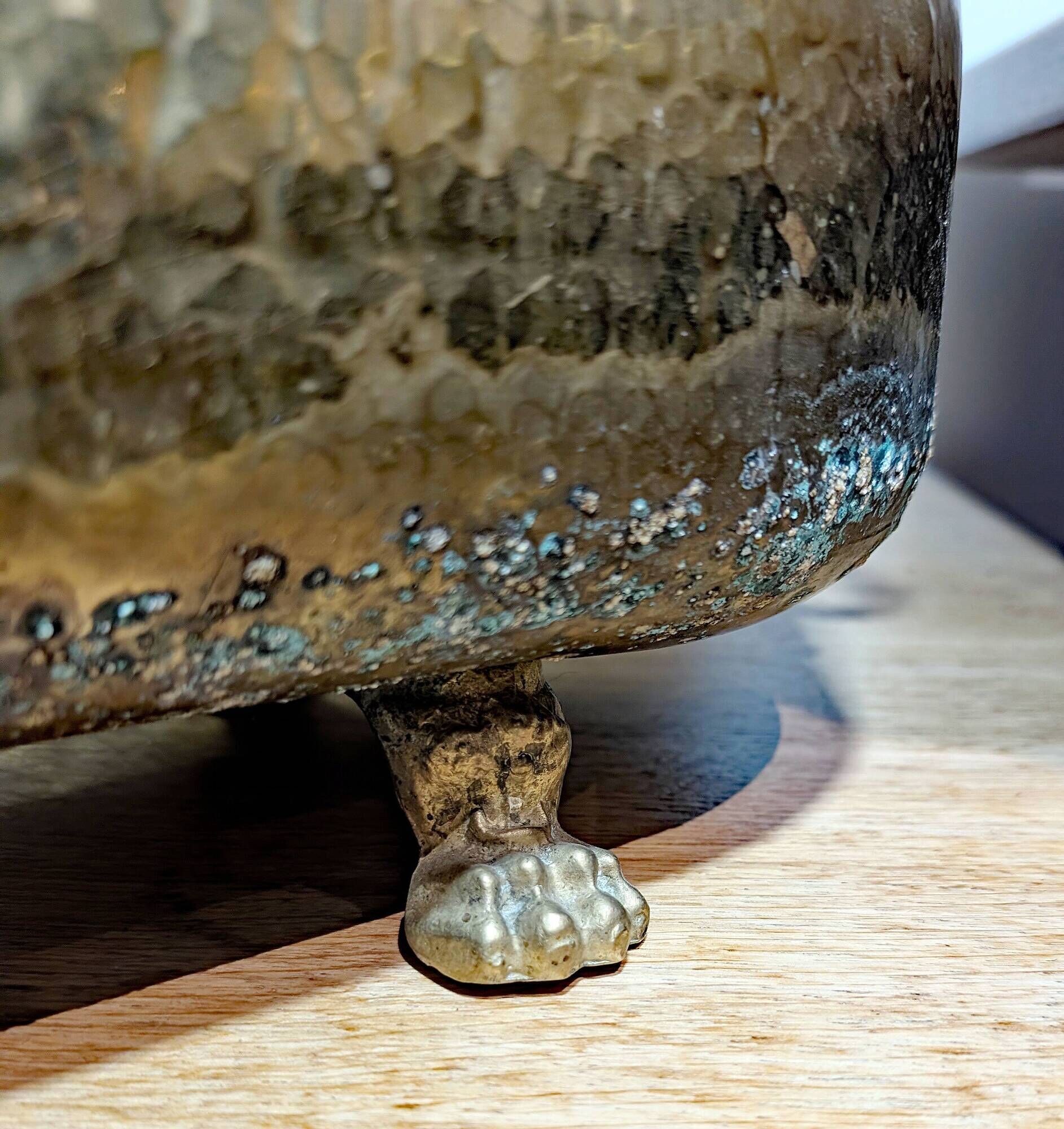 Pair of large antique planters with lion's paw feet.
