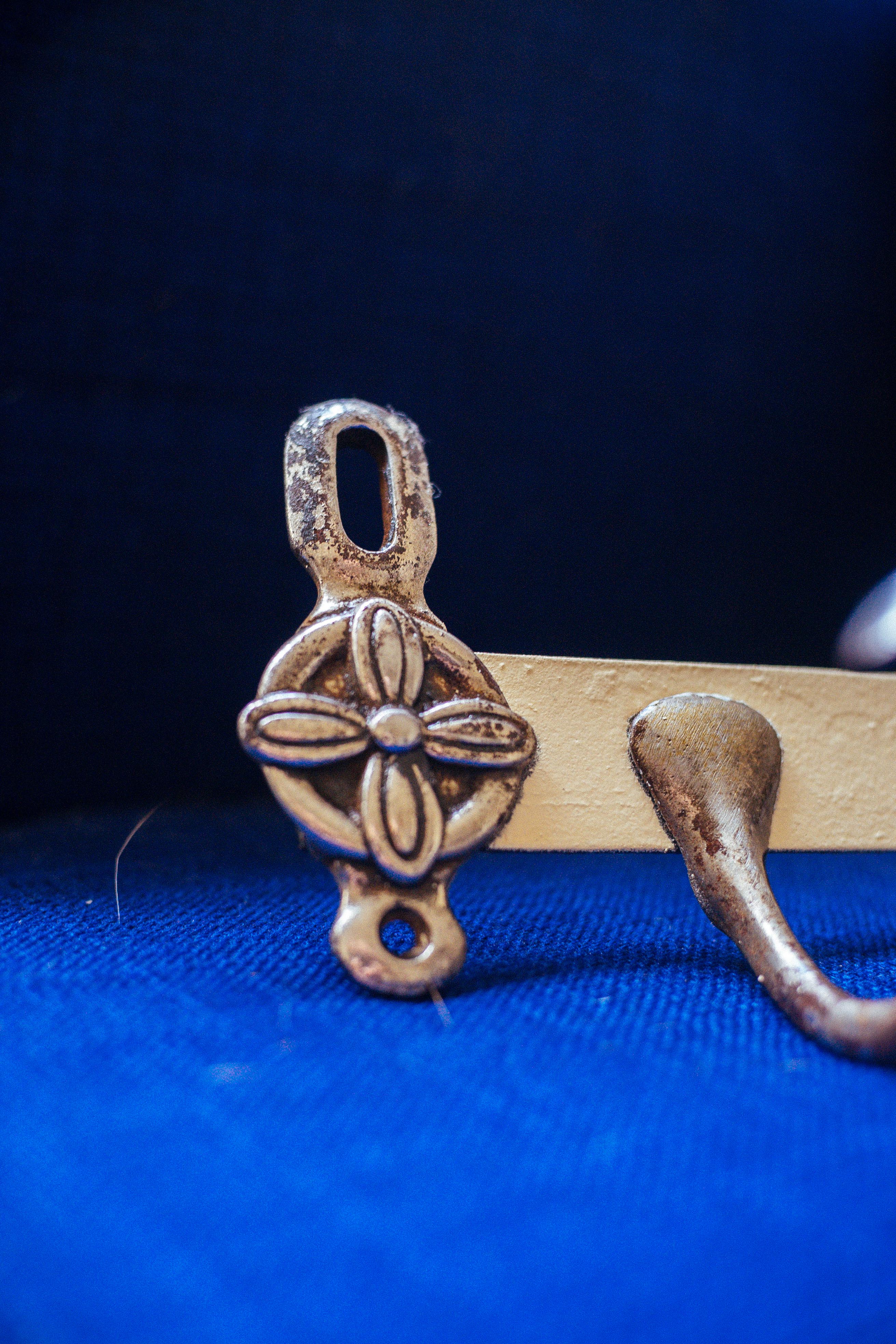 Antique wrought iron coat rack