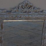 Miroir ancien chic et de style avec cadre bois sculpté en blanc cérusé et doré